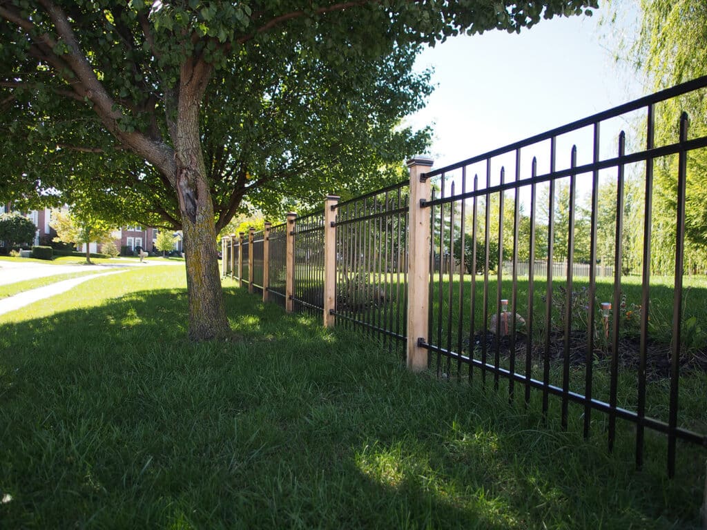 Custom aluminum fence installation with cedar posts in Cincinnati