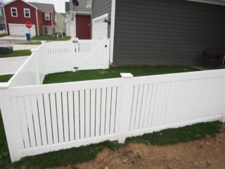 White vinyl semi-private fence installation around Cincinnati