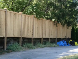 company for installing wood fence on a slope in Cincinnati
