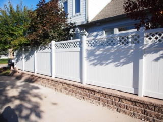 Install a vinyl fence with lattice-top around Cincinnati